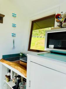 Imagine din galeria proprietății Black Sails Kuaotunu - across road from beach! în Kuaotunu