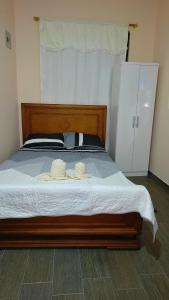 Postel nebo postele na pokoji v ubytování Dannas-Pearl