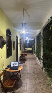 Телевизор и/или развлекательный центр в Hostel Cajueiro +26 фотографий