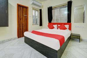 Postel nebo postele na pokoji v ubytování Hotel O Avisi Residency