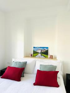 Un pat sau paturi într-o cameră la Appartamenti reali - I giardini reali +11 fotografii