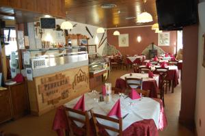 Restaurace v ubytování Hotel Delle Alpi + 10 fotografií