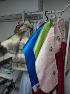 a group of ties are hanging on a rack at Romantic Winter Package , K-Culture Experience Itaewon 7min,2F Korean Culture Zone ,Terrace , K-Ramen Challenge in Seoul