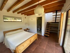 Ένα ή περισσότερα κρεβάτια σε δωμάτιο στο Careo2025