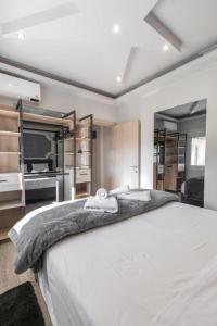 Ένα ή περισσότερα κρεβάτια σε δωμάτιο στο Aristotelous Amelia House