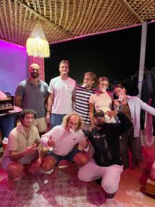 a group of people posing for a picture at Talia Surf Morocco in Taghazout