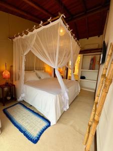 Postel nebo postele na pokoji v ubytování Vila BeiradeiRô - Taipu de Fora