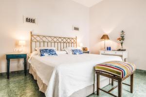 Un ou plusieurs lits dans un hébergement de l'établissement Hotel Boutique Casa de Colón