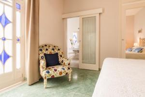 Un ou plusieurs lits dans un hébergement de l'établissement Hotel Boutique Casa de Colón