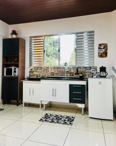 Kuchyň nebo kuchyňský kout v ubytování Hospedagem Marechal 02