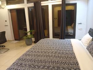 Postel nebo postele na pokoji v ubytování LA Maison Sur Le Fleuve + 6 fotografií