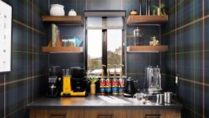 a kitchen with a counter top with aounter at Roca Roja by AvantStay Mountain Views in the Heart of Sedona in Sedona +44 photos