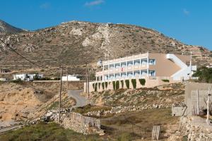 a building on the side of a mountain at Athena Pallas in Arkasa