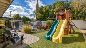 Детская игровая зона в Backyard Pool PuttingGreen Playground Modern 5BDR White Agate by AvantStay