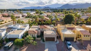 an aerial view of a residential neighborhood with houses at Pool Hot Tub Yard Games Chic Midcentury Design Painted Sand by AvantStay in Bermuda Dunes