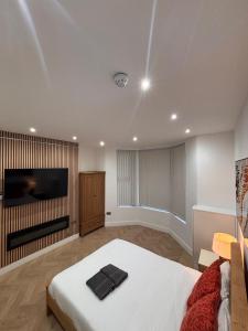 TV a/nebo společenská místnost v ubytování Hendham Rooms + 65 fotografií