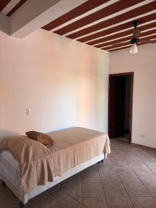 Postel nebo postele na pokoji v ubytování Pousada Casa do Cais