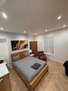 Postel nebo postele na pokoji v ubytování Hendham Rooms