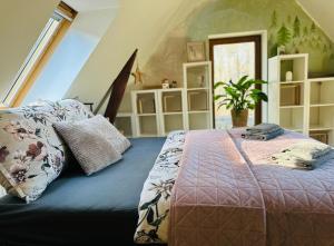 En eller flere senge i et værelse på Rezydencja Sudecka