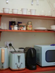 Kuchyň nebo kuchyňský kout v ubytování Birdsland Suite