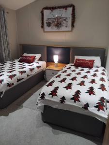 Ένα ή περισσότερα κρεβάτια σε δωμάτιο στο Sea Breeze, Luxury Lodge, Parkdean Resort Southview, Skegness, Dog Friendly - East Coast Holidays