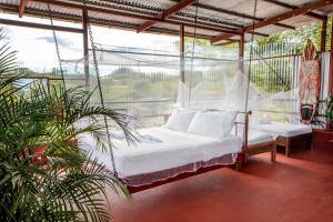 Postel nebo postele na pokoji v ubytování Villas Jacquelina + 73 fotografií