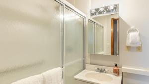 a bathroom with a shower and a sink at Whidbey Bliss by AvantStay 2min to Beach View in Greenbank +31 photos
