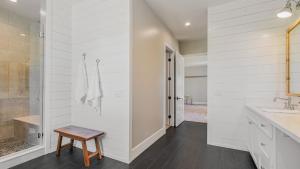 a white bathroom with a sink and a shower at Cooperage by AvantStay Vineyard Views Soccer in Templeton +32 photos