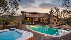 a swimming pool in front of a house at Gable by AvantStay Beautiful 3.5 Acre Oasis w Gorgeous Views Pool Hot Tub in Santa Rosa