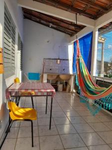 En balkon eller terrasse på Hospedagem CasAdobe Hostel Pirapora MG