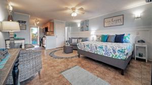 a bedroom with a bed and a living room at Studio w Balcony Pools Direct Beach Access Seaside Blessing by AvantStay in Port Aransas