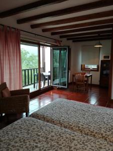 Giường trong phòng chung tại T0 Eira Frente