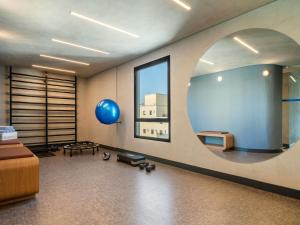 a room with a blue balloon and a mirror at Novotel SP Jardins in Sao Paulo