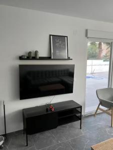 a living room with a fireplace and a black coffee table at Villa Domicil de Luxe in Torrevieja