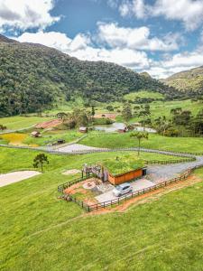 an overhead view of a building with plants on it at Cabanas Recanto das Lagoas in Bom Retiro