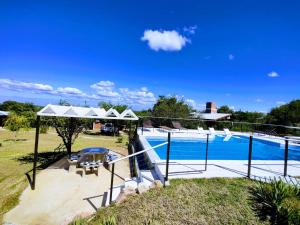 an image of a swimming pool in a house at Rincón Soñado in Las Rabonas