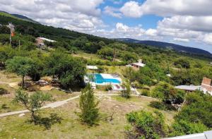 an aerial view of a house with a swimming pool at Rincón Soñado in Las Rabonas