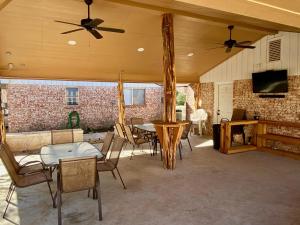 a living room with a table and chairs at North Star in Concan