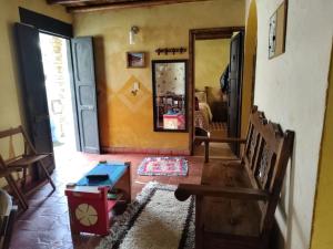 a living room with a couch and a table in a room at Solue in Duitama