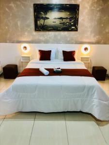 Postel nebo postele na pokoji v ubytování Hospedagem Marechal 03