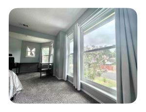 Кровать или кровати в номере Private Room near JFK, UBS Arena