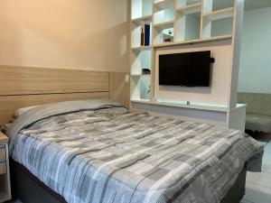 Ένα ή περισσότερα κρεβάτια σε δωμάτιο στο Apartamento - Life Space Estação +21 φωτογραφίες