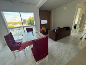 TV/trung tâm giải trí tại Apartamento completo com AR Condicionado em Viamao