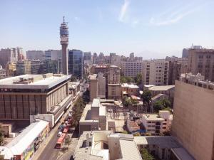 an aerial view of a city with buildings and cars at Metroapart 1 in Santiago