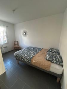 Кровать или кровати в номере Maison Élodie