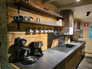 Η κουζίνα ή μικρή κουζίνα στο Elegant Chalet Getaway in Ardennes