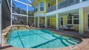 Πισίνα στο ή κοντά στο Walk to Beach PoolHot Tub Game Room Captiva 5BDR Coco Mango by AvantStay