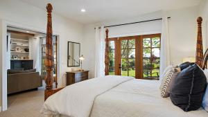 a bedroom with a large bed and a television at Wellsona Vineyard Retreat Pool Hot Tub Views Main Home Guest Home in Paso Robles +40 photos