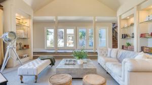a living room with a couch and a table at Sonoma Sunshine by AvantStay Countryside Views in Glen Ellen