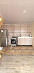 Kuchyň nebo kuchyňský kout v ubytování 2 Story Cabin